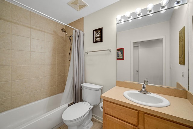 full bathroom with vanity, toilet, and shower / tub combo with curtain