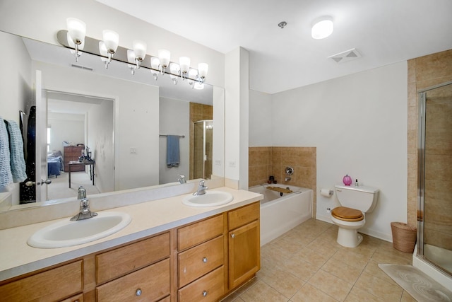 full bathroom with a garden tub, a sink, tile patterned flooring, and a stall shower