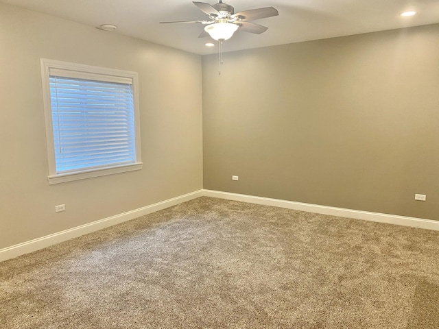 unfurnished room featuring carpet flooring, baseboards, a ceiling fan, and recessed lighting
