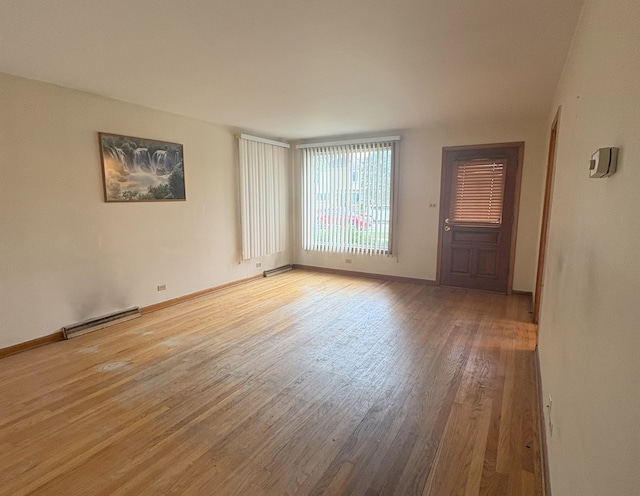 3506 Louis St, Franklin Park, IL 60131 - unfurnished room featuring wood finished floors and baseboards