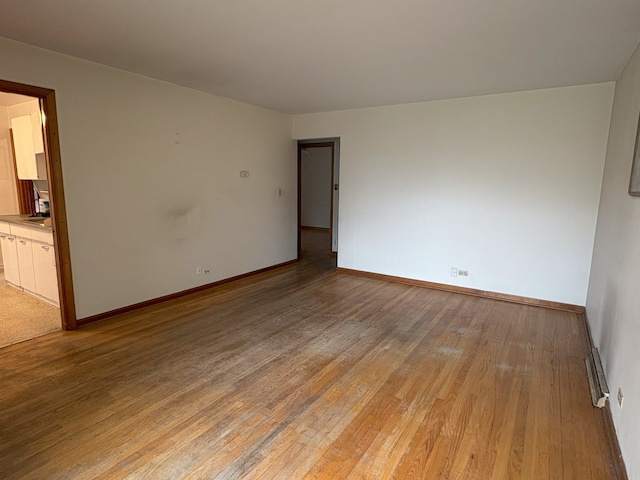 3506 Louis St, Franklin Park, IL 60131 - unfurnished room featuring light wood-style flooring and baseboards
