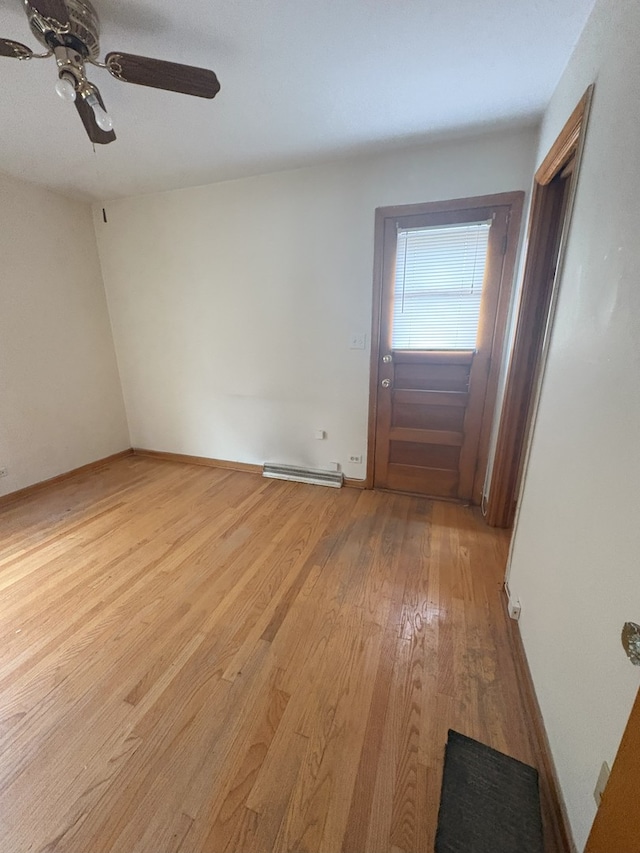 3506 Louis St, Franklin Park, IL 60131 - spare room with light wood-style flooring, ceiling fan, and baseboards