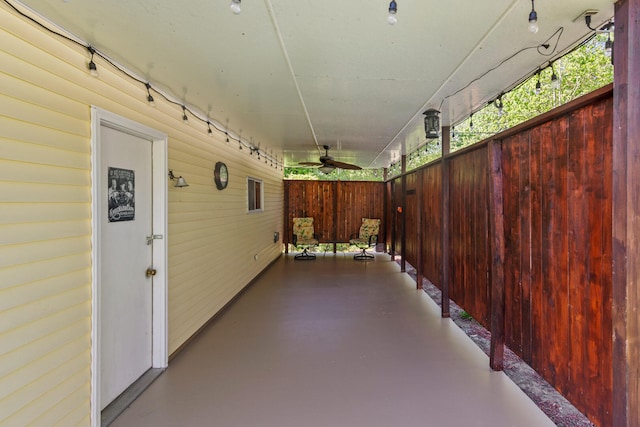 view of patio / terrace featuring ceiling fan