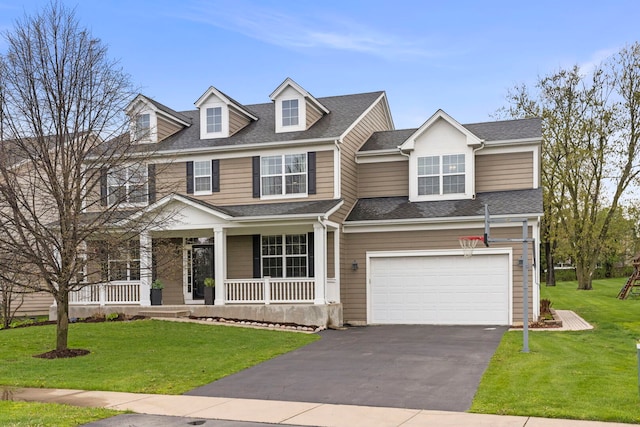 view of front of property featuring a garage, a front lawn, roof with shingles, a porch, and driveway