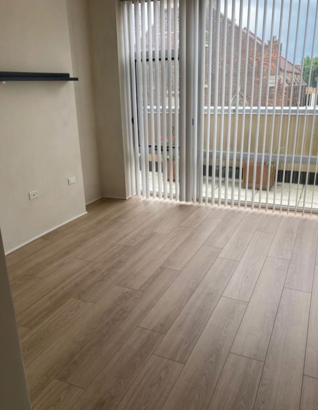 1740 Oak Ave Unit 307, Evanston, IL 60201 - empty room featuring wood finished floors
