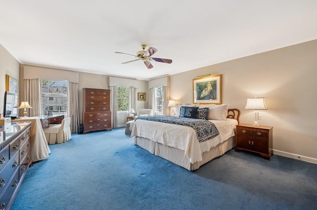bedroom featuring baseboards, carpet flooring, and ceiling fan