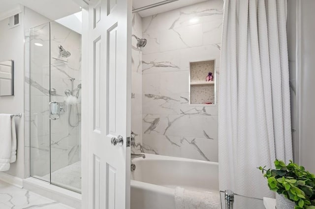 full bath featuring marble look tiles and shower / bath combo