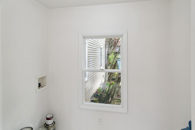 laundry room with washer hookup and laundry area