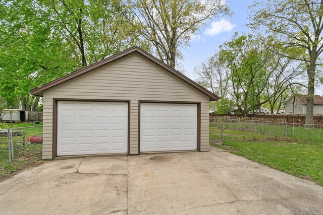 detached garage with fence