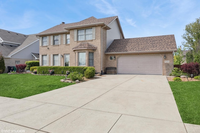11330 Brigitte Ter, Orland Park, IL 60462 - view of front of property featuring brick siding, a garage, a front lawn, concrete driveway, and a shingled roof