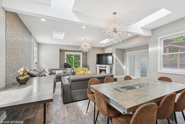 11330 Brigitte Ter, Orland Park, IL 60462 - dining area featuring a skylight, recessed lighting, a chandelier, and light wood-style flooring