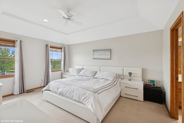 11330 Brigitte Ter, Orland Park, IL 60462 - bedroom with a raised ceiling, light carpet, baseboards, and ceiling fan