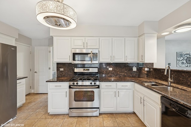 11330 Brigitte Ter, Orland Park, IL 60462 - kitchen with appliances with stainless steel finishes, a sink, white cabinets, and decorative backsplash