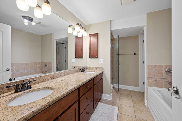 full bath with tile patterned floors, a shower stall, a bath, and double vanity
