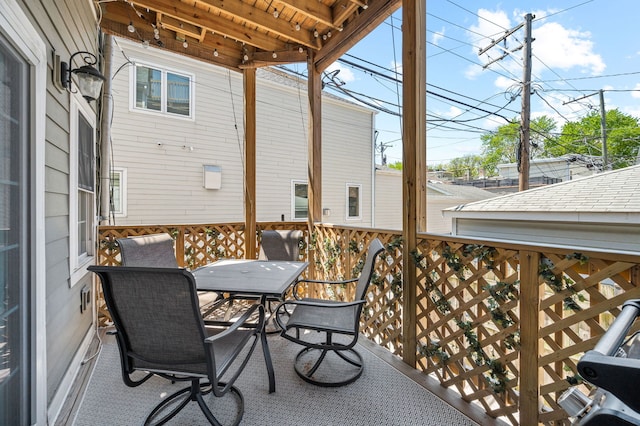sunroom / solarium with outdoor dining space