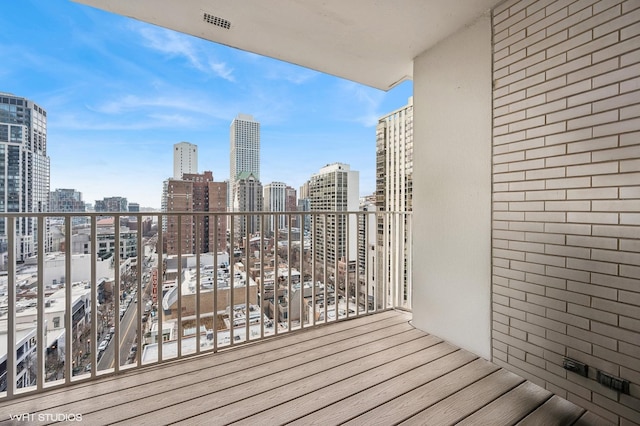 balcony featuring a city view