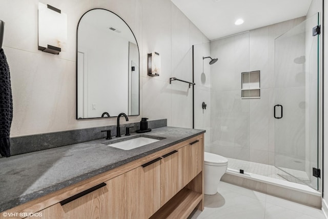 1934 W Patterson Ave, Chicago, IL 60613 - full bath with toilet, a shower stall, vanity, and tile patterned flooring