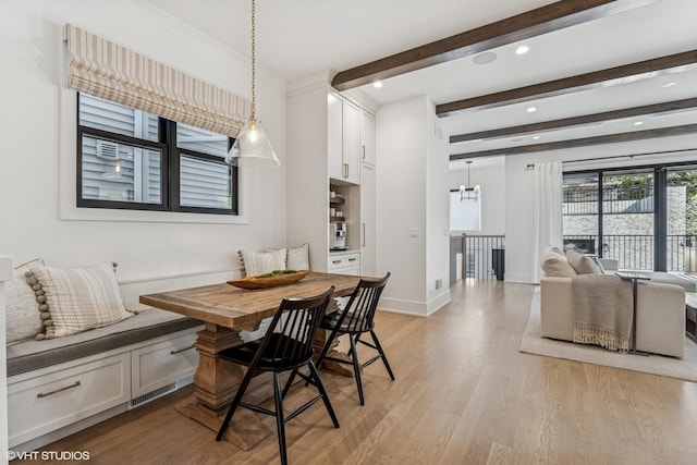 1934 W Patterson Ave, Chicago, IL 60613 - dining space with light wood-style flooring, a chandelier, beam ceiling, recessed lighting, and baseboards