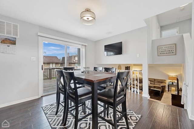 710 E 194th St, Glenwood, IL 60425 - dining area with baseboards, dark wood-style flooring, and visible vents