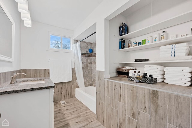 710 E 194th St, Glenwood, IL 60425 - bathroom with vanity, visible vents, wood finished floors, and shower / tub combo