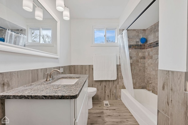 710 E 194th St, Glenwood, IL 60425 - full bathroom with visible vents, tile walls, a wainscoted wall, vanity, and toilet