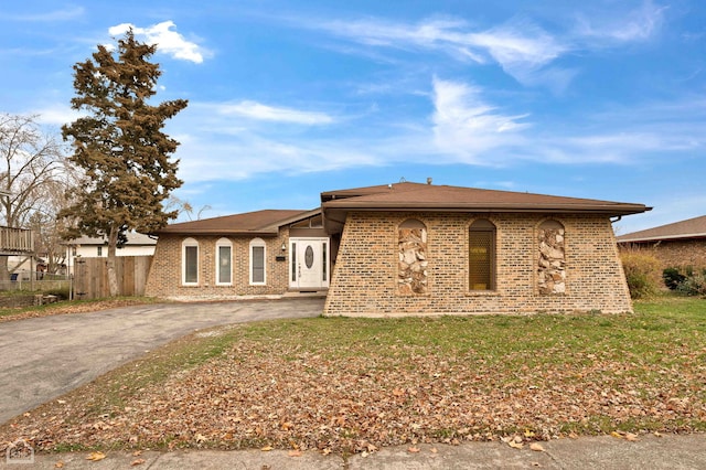 710 E 194th St, Glenwood, IL 60425 - ranch-style home with brick siding, aphalt driveway, and fence