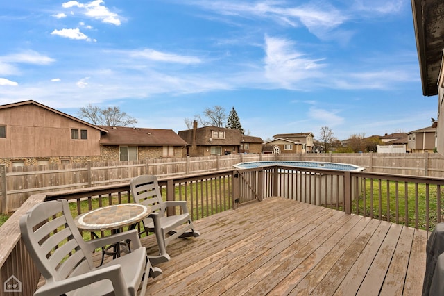 710 E 194th St, Glenwood, IL 60425 - deck featuring a lawn, a fenced in pool, a residential view, and a fenced backyard