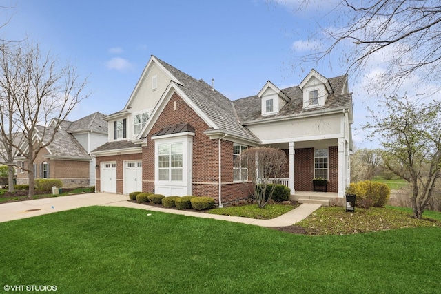 1107 Ashley Ln, Inverness, IL 60010 - view of front of house with brick siding, a porch, a front yard, and concrete driveway