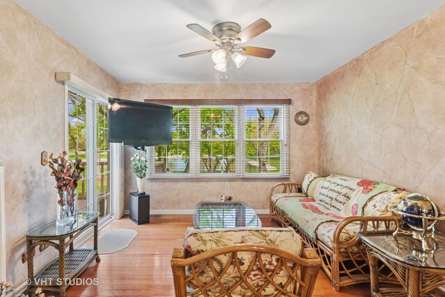 1537 Aberdeen Ct Unit 67, Naperville, IL 60564 - living area featuring a ceiling fan and wood finished floors