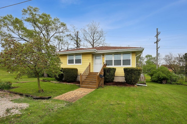 view of front of house with a front lawn