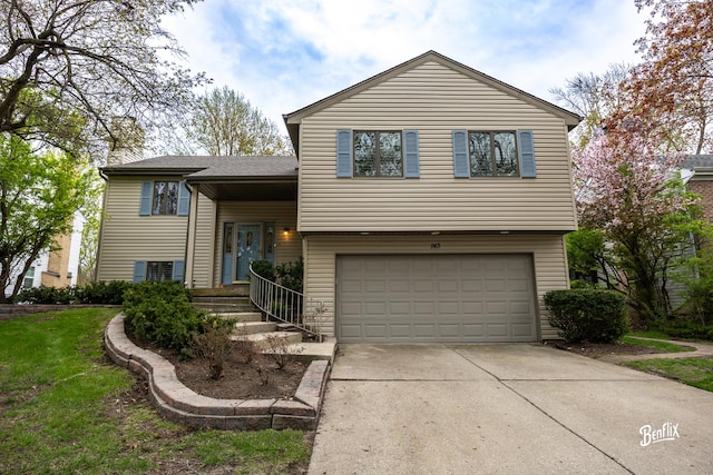 143 Midway Ln, Vernon Hills, IL 60061 - view of front of property featuring a garage and driveway
