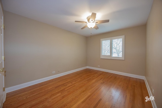 143 Midway Ln, Vernon Hills, IL 60061 - unfurnished room with baseboards, a ceiling fan, light wood-style flooring, and visible vents