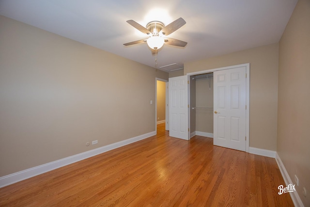 143 Midway Ln, Vernon Hills, IL 60061 - unfurnished bedroom with baseboards, ceiling fan, light wood-style flooring, and a closet