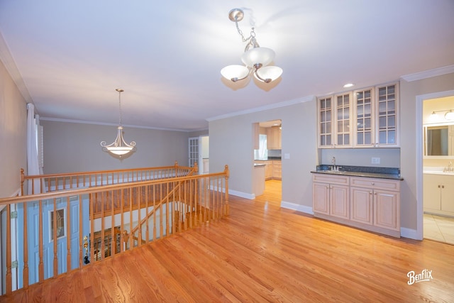 143 Midway Ln, Vernon Hills, IL 60061 - kitchen with glass insert cabinets, an inviting chandelier, light wood-style flooring, and crown molding