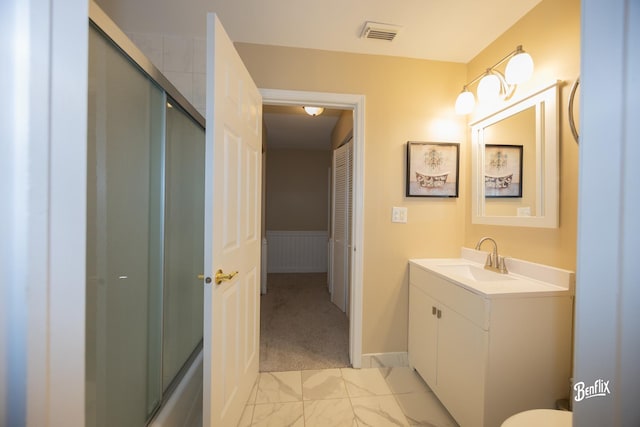 143 Midway Ln, Vernon Hills, IL 60061 - full bathroom with vanity, marble finish floor, baseboards, an enclosed shower, and visible vents