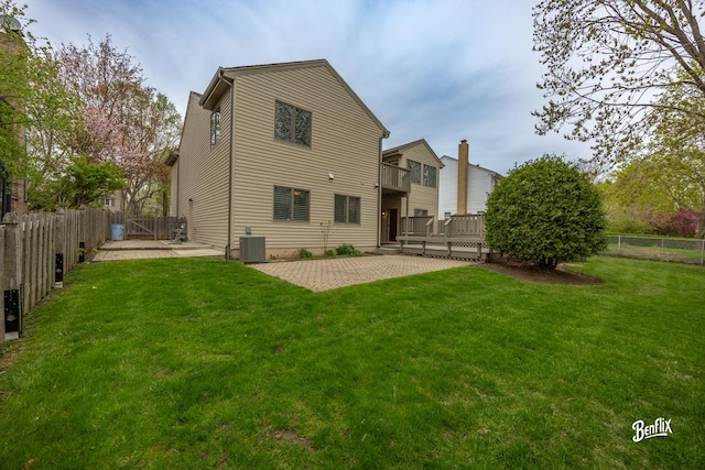 143 Midway Ln, Vernon Hills, IL 60061 - rear view of house featuring a patio, a fenced backyard, a wooden deck, and a yard