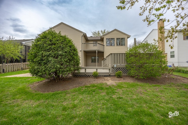143 Midway Ln, Vernon Hills, IL 60061 - back of house with a balcony, fence, a yard, and a deck