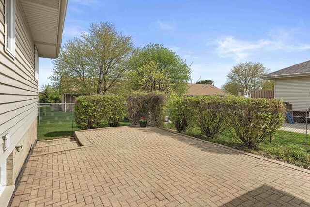 view of patio with fence