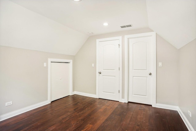 bonus room with visible vents, vaulted ceiling, baseboards, recessed lighting, and dark wood-type flooring