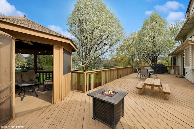 1210 Spring Hill Dr, Algonquin, IL 60102 - wooden terrace featuring a gazebo, outdoor dining area, and a fire pit