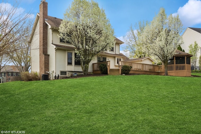 1210 Spring Hill Dr, Algonquin, IL 60102 - back of house with a yard, central AC, a chimney, and a wooden deck