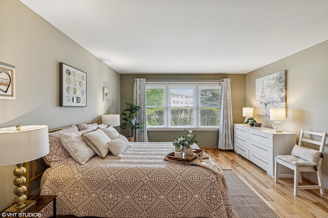 15733 Liberty Ct, Orland Park, IL 60462 - bedroom with baseboards and light wood-style floors