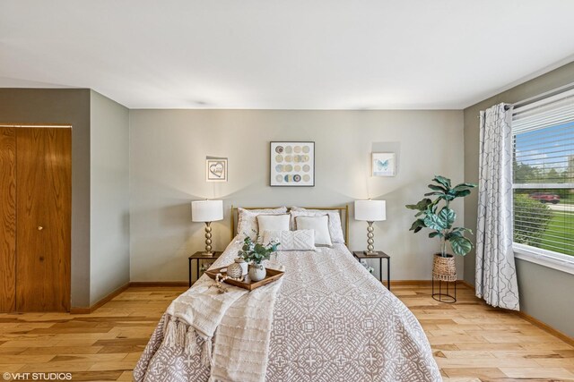 15733 Liberty Ct, Orland Park, IL 60462 - bedroom featuring wood finished floors and baseboards