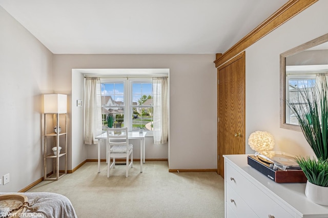 15733 Liberty Ct, Orland Park, IL 60462 - living area featuring light colored carpet, plenty of natural light, and baseboards