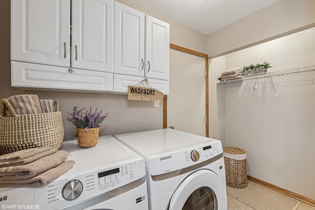 15733 Liberty Ct, Orland Park, IL 60462 - laundry room featuring light tile patterned floors, washer and dryer, and cabinet space