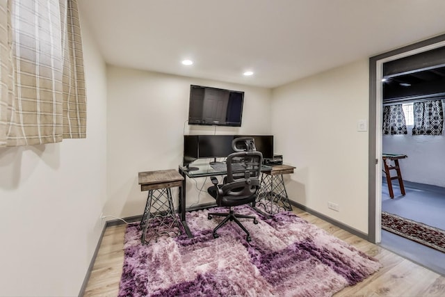 office space with wood finished floors, baseboards, and recessed lighting