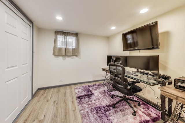 office with wood finished floors, baseboards, and recessed lighting
