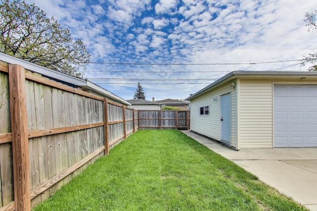 view of yard with a garage