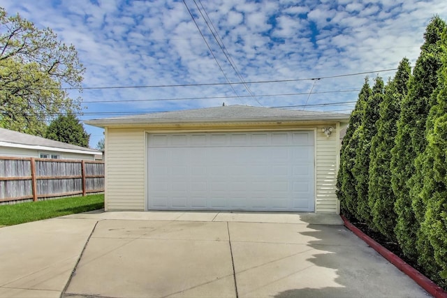 detached garage with fence