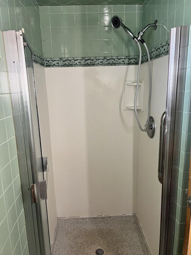 bathroom with a stall shower